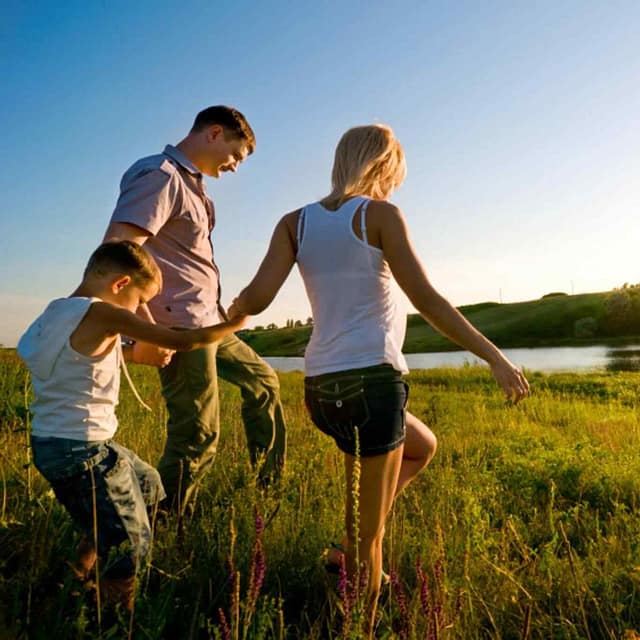 happy family having fun outdoors happy family having fun outdoors